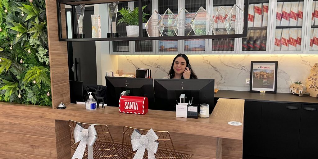 Receptionist Katelyn Pantaleo working her first office job!